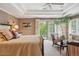 Bright main bedroom with a balcony access, plantation shutters, and stylish decor, perfect for relaxation at 5335 E 2Nd Ave, Denver, CO 80220