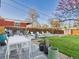 Spacious backyard offers both seating and lounging areas on the patio and lawn at 940 Hooker St, Denver, CO 80204