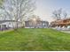 Expansive backyard features a lush green lawn and outdoor seating at 940 Hooker St, Denver, CO 80204