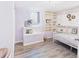 Cozy bedroom with built-in shelving and a charming chandelier at 940 Hooker St, Denver, CO 80204