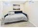 This bedroom features luxury vinyl plank flooring and natural light at 940 Hooker St, Denver, CO 80204