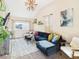 Inviting living room with comfortable seating, bright decor, and expansive window at 940 Hooker St, Denver, CO 80204
