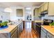 Functional kitchen with laminate countertops, ample cabinet space, and stainless steel appliances at 2161 Bowen St, Longmont, CO 80501