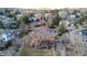 Aerial view of home showing deck, landscaping, and neighborhood at 4534 Palmer Ct, Longmont, CO 80503