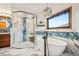Luxurious bathroom featuring a freestanding tub, glass shower, and modern fixtures at 4534 Palmer Ct, Longmont, CO 80503