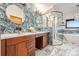 Modern bathroom featuring a double vanity, glass shower, and contemporary finishes at 4534 Palmer Ct, Longmont, CO 80503