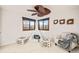 Playful bedroom setup with teepee tent, unique decor, and natural light at 4534 Palmer Ct, Longmont, CO 80503