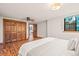 Primary bedroom boasts wood floors, a ceiling fan, and closet at 4534 Palmer Ct, Longmont, CO 80503