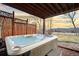 Backyard hot tub with privacy screen, perfect for relaxation at 4534 Palmer Ct, Longmont, CO 80503