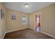 Cozy bedroom with neutral walls, carpet floors and bright window at 9406 Troon Village Way, Lone Tree, CO 80124