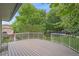 Spacious deck overlooks a lush backyard, providing plenty of space for outdoor enjoyment at 9406 Troon Village Way, Lone Tree, CO 80124