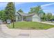 Charming single-story home with well-manicured lawn and an attached two-car garage at 9406 Troon Village Way, Lone Tree, CO 80124