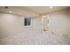 Bright basement room with window and carpet at 19229 E Legend Ave, Parker, CO 80134