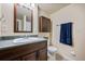 Basement bathroom with toilet, sink, and shower at 19229 E Legend Ave, Parker, CO 80134