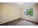 Bright bedroom with window and carpet at 19229 E Legend Ave, Parker, CO 80134