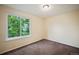 Bright bedroom with large window and carpet at 19229 E Legend Ave, Parker, CO 80134