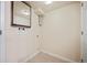 Basement laundry room with hookups and storage at 19229 E Legend Ave, Parker, CO 80134
