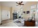 Cozy living room featuring a fireplace and neutral color palette at 19229 E Legend Ave, Parker, CO 80134