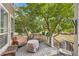 Relaxing outdoor deck featuring comfortable seating and views of the beautiful backyard at 3163 Soaring Eagle Ln, Castle Rock, CO 80109