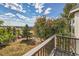 Scenic backyard with a spacious deck overlooking a beautiful landscape and blue sky at 3163 Soaring Eagle Ln, Castle Rock, CO 80109