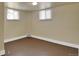 Finished basement featuring modern floors and bright natural light at 1418 Perry St, Denver, CO 80204
