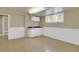 Finished basement with utility sink and white wainscoting at 1418 Perry St, Denver, CO 80204
