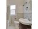 Bathroom featuring vanity with sink, toilet and shower at 1418 Perry St, Denver, CO 80204