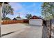 Detached one car garage with a fenced backyard at 1418 Perry St, Denver, CO 80204