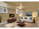 Comfortable living room with neutral color palette, large sofa and decorative rug at 1418 Perry St, Denver, CO 80204