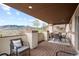 Outdoor balcony with seating and panoramic views of mountains and city at 415 Butte Pkwy, Golden, CO 80403