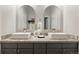 Elegant bathroom with dual vessel sinks, granite countertop, and stylish decor at 415 Butte Pkwy, Golden, CO 80403