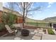 Cozy backyard firepit area with mountain views, perfect for outdoor entertaining and relaxation at 415 Butte Pkwy, Golden, CO 80403