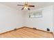 Bright bedroom with hardwood flooring, neutral paint and ceiling fan at 3515 Grape St, Denver, CO 80207