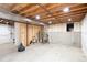 Unfinished basement with exposed ceiling, concrete foundation, and open space, ready for customization at 10591 Hyacinth St, Highlands Ranch, CO 80129