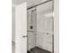 Walk-in shower with glass door and marble tile surround with brushed nickel fixtures at 10591 Hyacinth St, Highlands Ranch, CO 80129