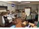 Basement kitchen with cabinets, appliances, and seating at 3910 E Orchard Rd, Centennial, CO 80121