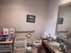 Bathroom featuring grab bars and a marble countertop at 3910 E Orchard Rd, Centennial, CO 80121
