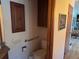 Bathroom featuring grab bars and dark wood cabinets at 3910 E Orchard Rd, Centennial, CO 80121