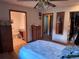 Cozy bedroom featuring hardwood floors and a ceiling fan at 3910 E Orchard Rd, Centennial, CO 80121