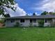 Charming one-story home with a well-maintained lawn and mature trees in a residential neighborhood at 3910 E Orchard Rd, Centennial, CO 80121