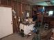Garage interior showing storage and clutter at 3910 E Orchard Rd, Centennial, CO 80121