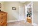 Carpeted bedroom with a dresser and an open doorway at 2215 Meade St, Denver, CO 80211