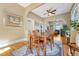 Dining area boasts hardwood floors and easy access to kitchen and living spaces at 2215 Meade St, Denver, CO 80211