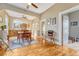 Dining area features hardwood floors and open layout to the kitchen and living room at 2215 Meade St, Denver, CO 80211