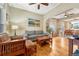 Inviting living room featuring hardwood floors and open layout to the dining area at 2215 Meade St, Denver, CO 80211