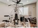 Fully equipped exercise room with weight machine and natural light, ready for your workout routine at 3308 County Road 19, Fort Lupton, CO 80621