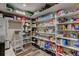 Spacious pantry with ample shelving, providing plenty of storage space at 3308 County Road 19, Fort Lupton, CO 80621
