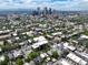 Extensive aerial view with the property outlined, showcasing its location relative to the city skyline at 1258 N Downing St, Denver, CO 80218