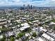 Extensive aerial view with the property outlined, showcasing its location relative to the city skyline at 1258 N Downing St, Denver, CO 80218