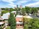 Scenic view of the property in a neighborhood with lush greenery and city skyline backdrop at 1258 N Downing St, Denver, CO 80218